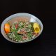 Appetizer salad kontinental segar dengan selada, tomat, mentimun, dan vinaigrette ringan
